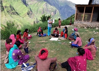 Phase WorldWide: a group of people are being shown safe handwashing techniques during COVID-19 pandemic